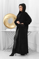 فروة شتوية طويلة مبطنة بالفرو من الداخل مزودة بفرو...