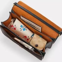 حقيبة كوتش كوين فوري