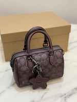 حقيبة كوتش ميني روان عنابي فوري