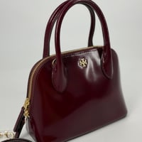 حقيبة توري بورش ايمرسون دوم لماع عنابي فوري | Tory...