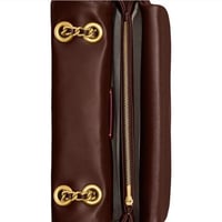 حقيبة كوتش تابي ٢٦ عنابي فوري