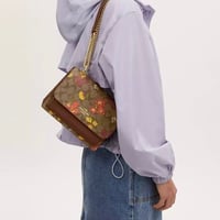 حقيبة كوتش كلير مورد فوري