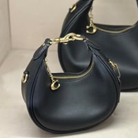 حقيبة كوتش ميني جوني فوري