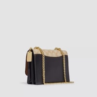 حقيبة كوتش كلير بيج/بني فوري