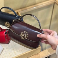 حقيبة توري بورش ميني برتن توب هاندل عنابي فوري