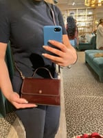 حقيبة توري بورش ايمرسون توب هاندل عنابي لماع فوري