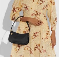 حقيبة كوتش سوينجر فوري