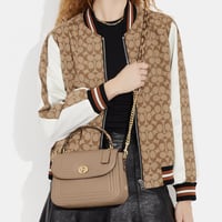 شنطة كوتش مارلي بمقبض علوي فوري