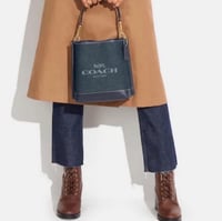 شنطة كوتش مولي بوكت قماش سمول فوري