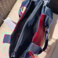 حقيبة تومي (فوري)