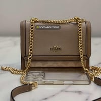 حقيبة كوتش ميني كلير قماش/جلد فوري