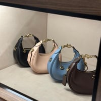 حقيبة كوتش ميني جوني فوري