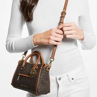 شنطة مايكل كورس ميني كارين فوري