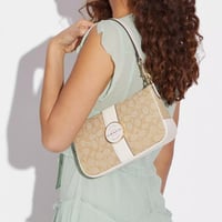 حقيبة كوتش لوني فوري