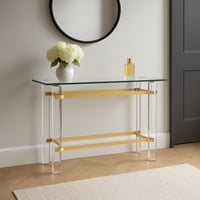 طاولة كونسول عصرية بزجاج وأكريليك مع تفاصيل معدنية...