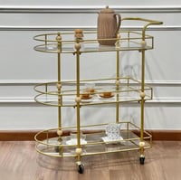 عربية تقديم 3 أدوار مزوده بعجلات لون ذهبي