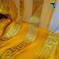 زري شيون مقلم ذهبي