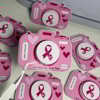 توزيعات لوشن ميني -بثيم التوعية من سرطان الثدي