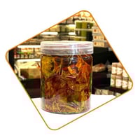 طماط بزيت الزيتون واكليل الجبل 500 مل تقريبا