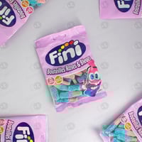 حلوى جيلي فيني على شكل قارورة باللون الوردي والأزر...