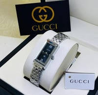 ساعة قوتشي فضي درجة 1