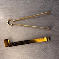 ملقاط فحم بتطريز