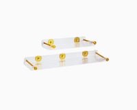 رف حمام شفاف على الجدار