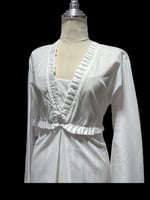 قميص رضاعة ابيض