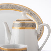 طقم سفرة بورسلين 47 قطعة فضي ذهبي