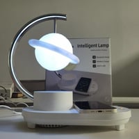 مودرن مرفل: مصباح ذكي مزود بشاحن لاسلكي للأجهزه ال...