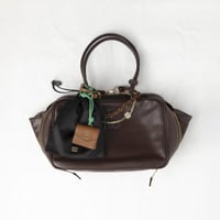 تعليقة miumiu جلد وحبل وحقيبة صغيرة