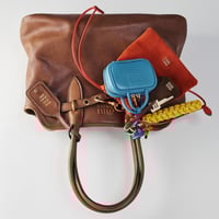 تعليقة miumiu من الحبل والنايلون