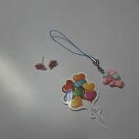 توزيعات تعليقه علي شكل بلونات +بشكل عشوائي تجي حلق...