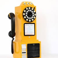 تلفون عمومي اصفر انتك