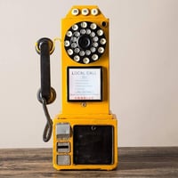 تلفون عمومي اصفر انتك