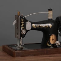 ديكور ماكينة خياطة حديد انتك