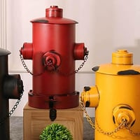 سلة مهملات شكل طرمبة اطفاء حديد