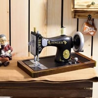 ديكور ماكينة خياطة حديد انتك