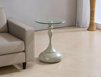 طاولة خدمة بسطح زجاج شفاف