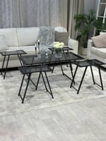 طقم طاولات أنيق بسطح زجاجي اسود ولمسات معدنية فاخر...