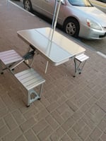 طاولة رحلات تتصفط مثل الشنطة