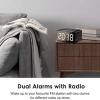 ساعة رقمية مع مكبر صوت وراديو وشاحن جوال لاسلكي