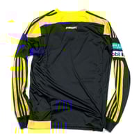 تيشيرت الاتحاد الأساسي 2015 بألوان الأصفر والأسود