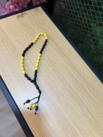 مسبحة نادي الاتحاد بتصميم فاخر وألوان الأسود والذه...