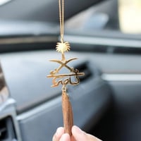 تعليقة سيفين ونخلة مع كسرة العود