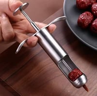 اداة ازالة نواة التمر