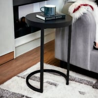 طاولة خدمة عصرية شكل دائري تدخل في الكنب لون أسود