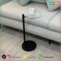 طاولة خدمة بسطح زجاجي شفاف