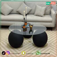 طاولة ضيافة زجاج بقواعد دائرية رخام بلون أسودTH