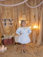 فستان مواليد ازرق فاتح بتفاصيل انيقه